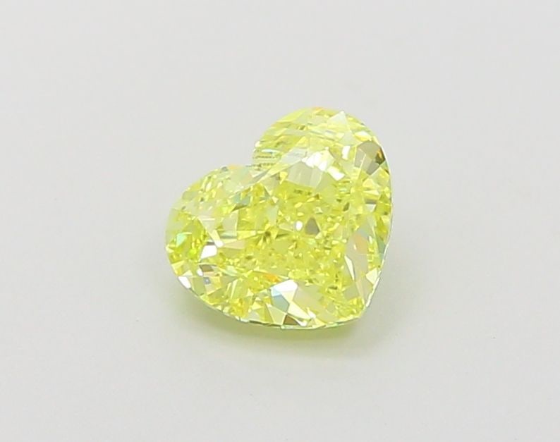 Loose Diamond - HEART 1.0ct Fancy Vivid Yellow VS1: Loose Diamond - HEART 1.0ct Fancy Vivid Yellow VS1 Source: This is a real non-mined Diamond that has been grown in a lab Shape: HEART Carats: 1.0 Color: Fancy Vivid Yellow Certification: IGI Video: