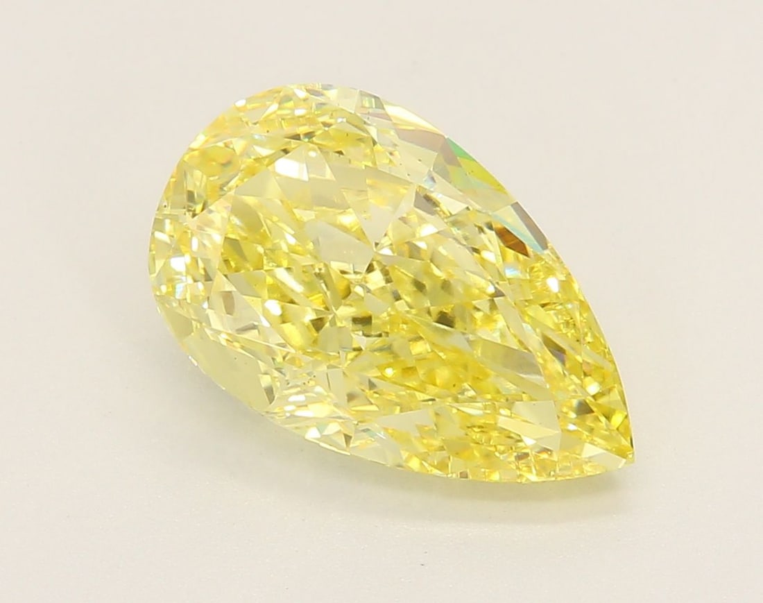 Loose Diamond - PEAR 4.33ct Fancy Vivid Yellow VS1: Loose Diamond - PEAR 4.33ct Fancy Vivid Yellow VS1 Source: This is a real non-mined Diamond that has been grown in a lab Shape: PEAR Carats: 4.33 Color: Fancy Vivid Yellow Certification: IGI Video: