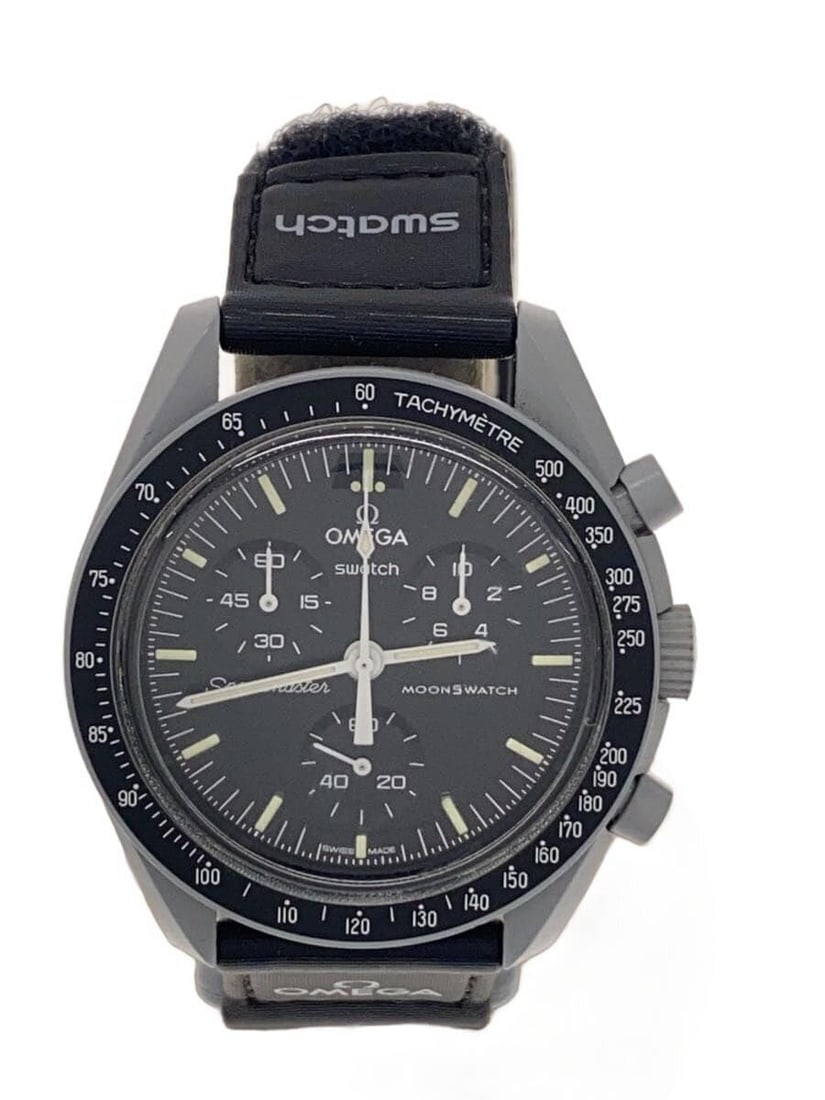 OMEGAxSWATCH Mission to the Moon Quartz Black Nylon Wristwatch: OMEGAxSWATCH Mission to the Moon Quartz Black Nylon Wristwatch This OMEGAxSWATCH Quartz MISSION TO THE MOON men's wristwatch features a sleek black design and is crafted with materials sourced from Sw