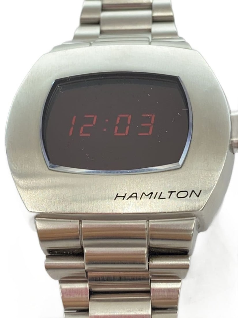 Hamilton PSR H524140 Black Digital Quartz Wristwatch: Hamilton PSR H524140 Black Digital Quartz Wristwatch This men's Hamilton PSR Digital Quartz H524140 wristwatch features a black case and band. The watch shows signs of use, including minor scratches a