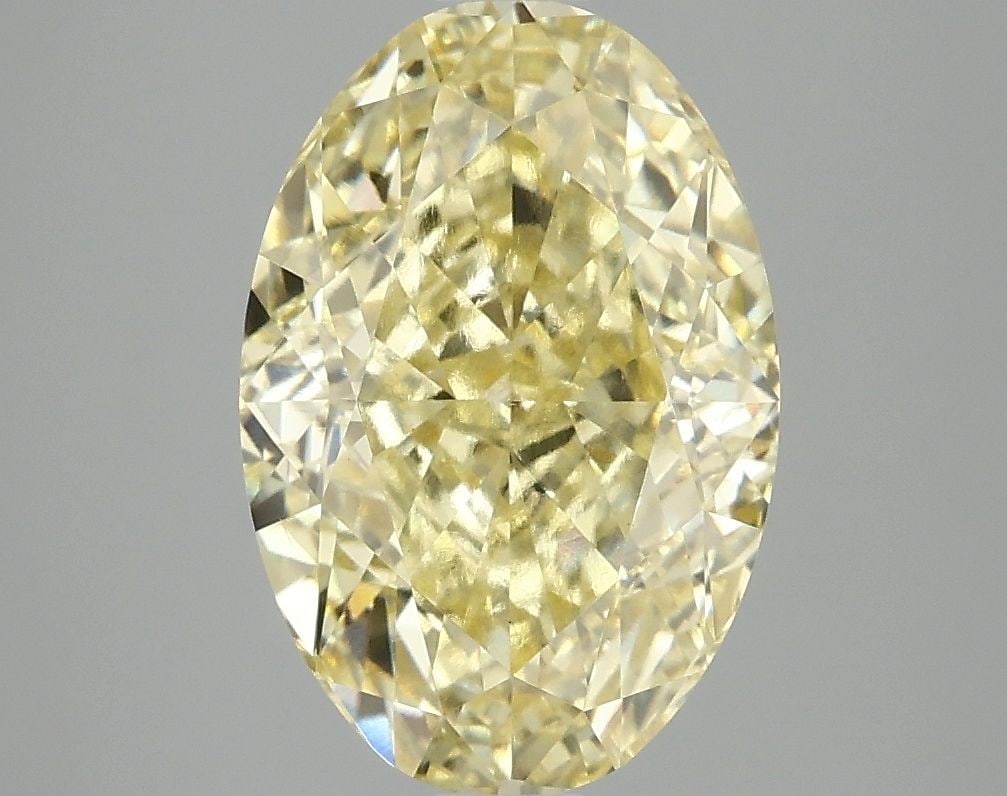 Loose Diamond - OVAL 4.07ct Fancy Vivid Yellow VS1: Loose Diamond - OVAL 4.07ct Fancy Vivid Yellow VS1 Source: This is a real non-mined Diamond that has been grown in a lab Shape: OVAL Carats: 4.07 Color: Fancy Vivid Yellow Certification: IGI Video: