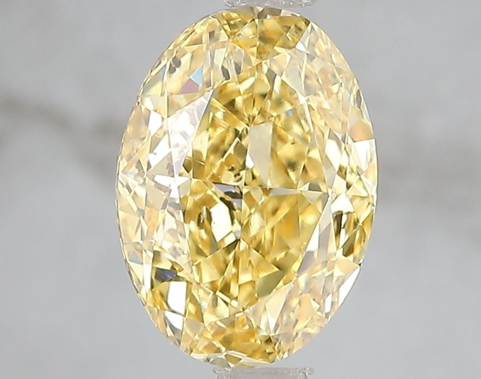Loose Diamond - OVAL 2.52ct Fancy Vivid Yellow SI1: Loose Diamond - OVAL 2.52ct Fancy Vivid Yellow SI1 Source: This is a real non-mined Diamond that has been grown in a lab Shape: OVAL Carats: 2.52 Color: Fancy Vivid Yellow Certification: IGI Video: