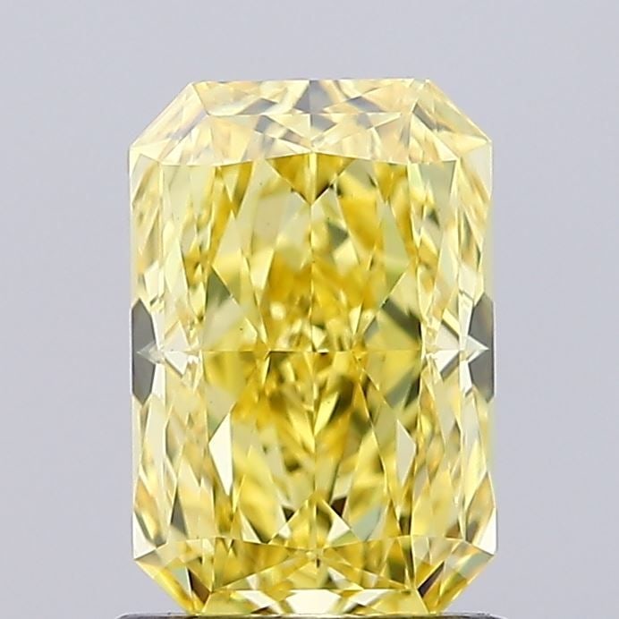 Loose Diamond - RADIANT 1.3ct Fancy Vivid Yellow VS1: Loose Diamond - RADIANT 1.3ct Fancy Vivid Yellow VS1 Source: This is a real non-mined Diamond that has been grown in a lab Shape: RADIANT Carats: 1.3 Color: Fancy Vivid Yellow Certification: IGI Video