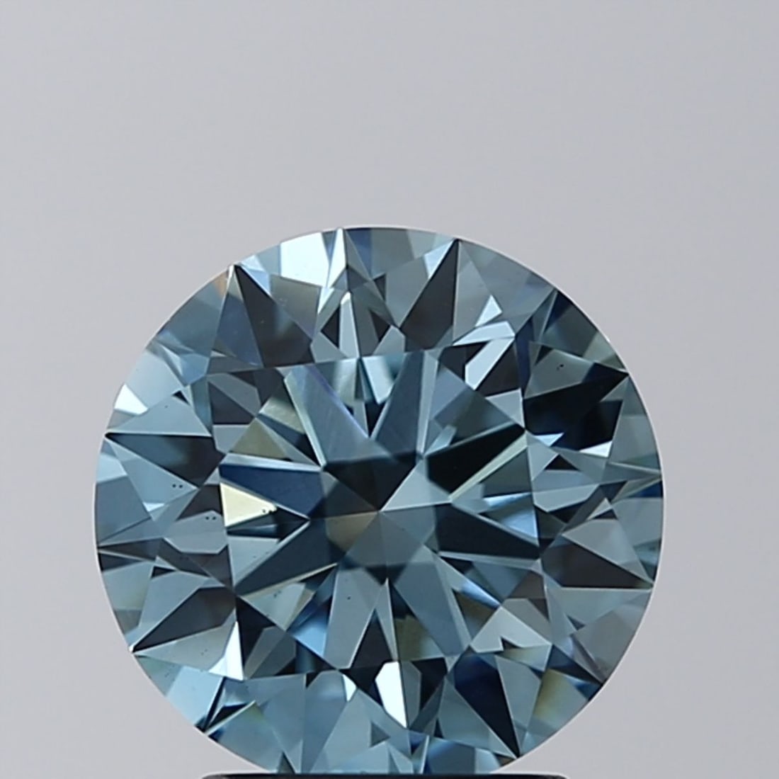 Ideal Loose Diamond - ROUND 2.3ct Fancy Vivid Blue VS2: Ideal Loose Diamond - ROUND 2.3ct Fancy Vivid Blue VS2 Source: This is a real non-mined Diamond that has been grown in a lab Shape: ROUND Carats: 2.3 Color: Fancy Vivid Blue Certification: IGI Video: