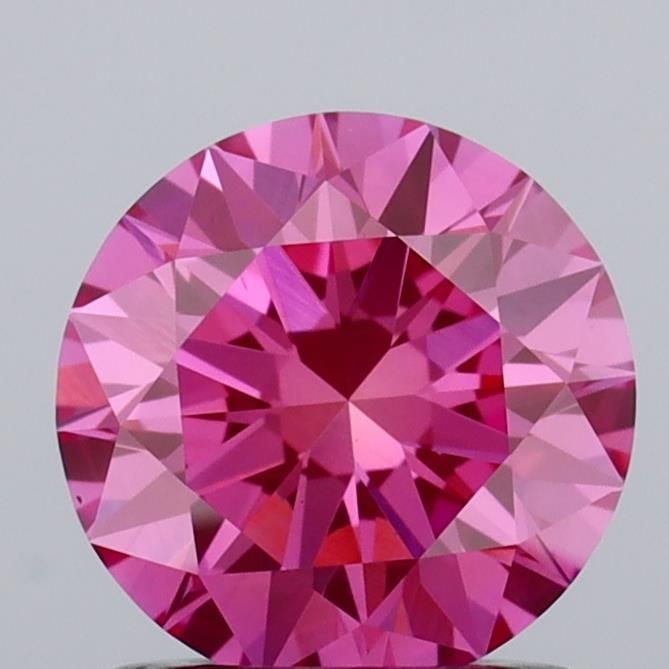 Ideal Loose Diamond - ROUND 1.09ct Fancy Vivid Pink VS1: Ideal Loose Diamond - ROUND 1.09ct Fancy Vivid Pink VS1 Source: This is a real non-mined Diamond that has been grown in a lab Shape: ROUND Carats: 1.09 Color: Fancy Vivid Pink Certification: IGI