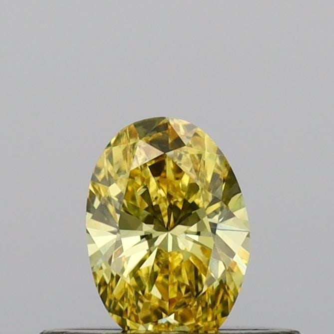 Loose Diamond - OVAL 0.3ct Fancy Vivid Yellow VS2: Loose Diamond - OVAL 0.3ct Fancy Vivid Yellow VS2 Source: This is a real non-mined Diamond that has been grown in a lab Shape: OVAL Carats: 0.3 Color: Fancy Vivid Yellow Certification: IGI Video: