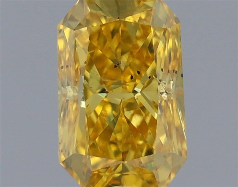 Loose Diamond - RADIANT 0.46ct Fancy Vivid Yellow SI2: Loose Diamond - RADIANT 0.46ct Fancy Vivid Yellow SI2 Source: This is a real non-mined Diamond that has been grown in a lab Shape: RADIANT Carats: 0.46 Color: Fancy Vivid Yellow Certification: IGI Vid