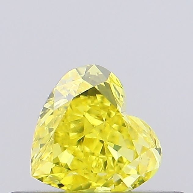 Loose Diamond - HEART 0.3ct Fancy Vivid Yellow VS1: Loose Diamond - HEART 0.3ct Fancy Vivid Yellow VS1 Source: This is a real non-mined Diamond that has been grown in a lab Shape: HEART Carats: 0.3 Color: Fancy Vivid Yellow Certification: NONE Video: