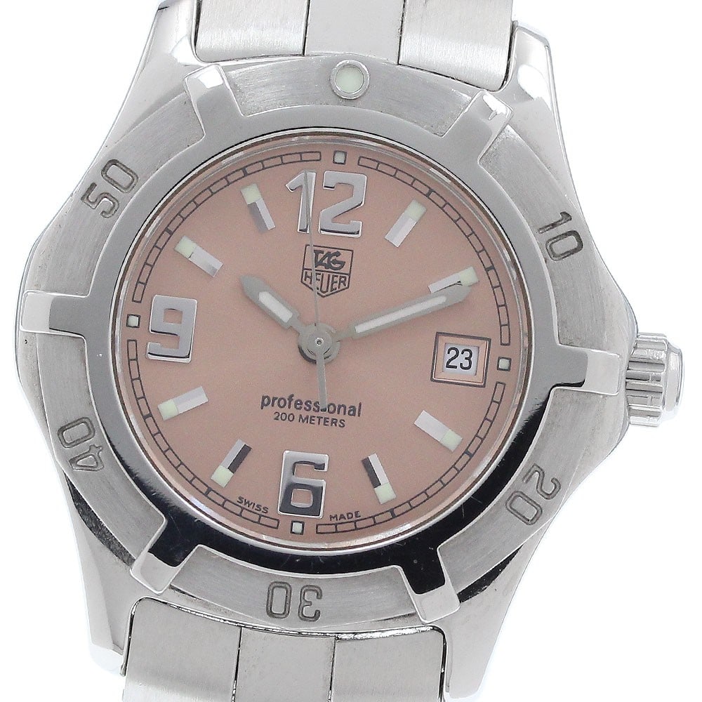 TAG Heuer 2000 Exclusive Pink Dial Quartz Ladies Watch WN1314: TAG Heuer 2000 Exclusive Pink Dial Quartz Ladies Watch WN1314 This TAG HEUER 2000 Exclusive WN1314 is a Swiss-made women's wristwatch featuring a stainless steel case and bracelet with a pink dial. It
