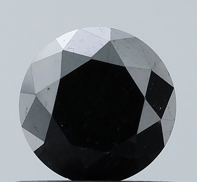 Loose Diamond - ROUND 0.94ct Black VVS2: Loose Diamond - ROUND 0.94ct Black VVS2 Source: Natural Shape: ROUND Carats: 0.94 Color: Black Certification: NONE Video: