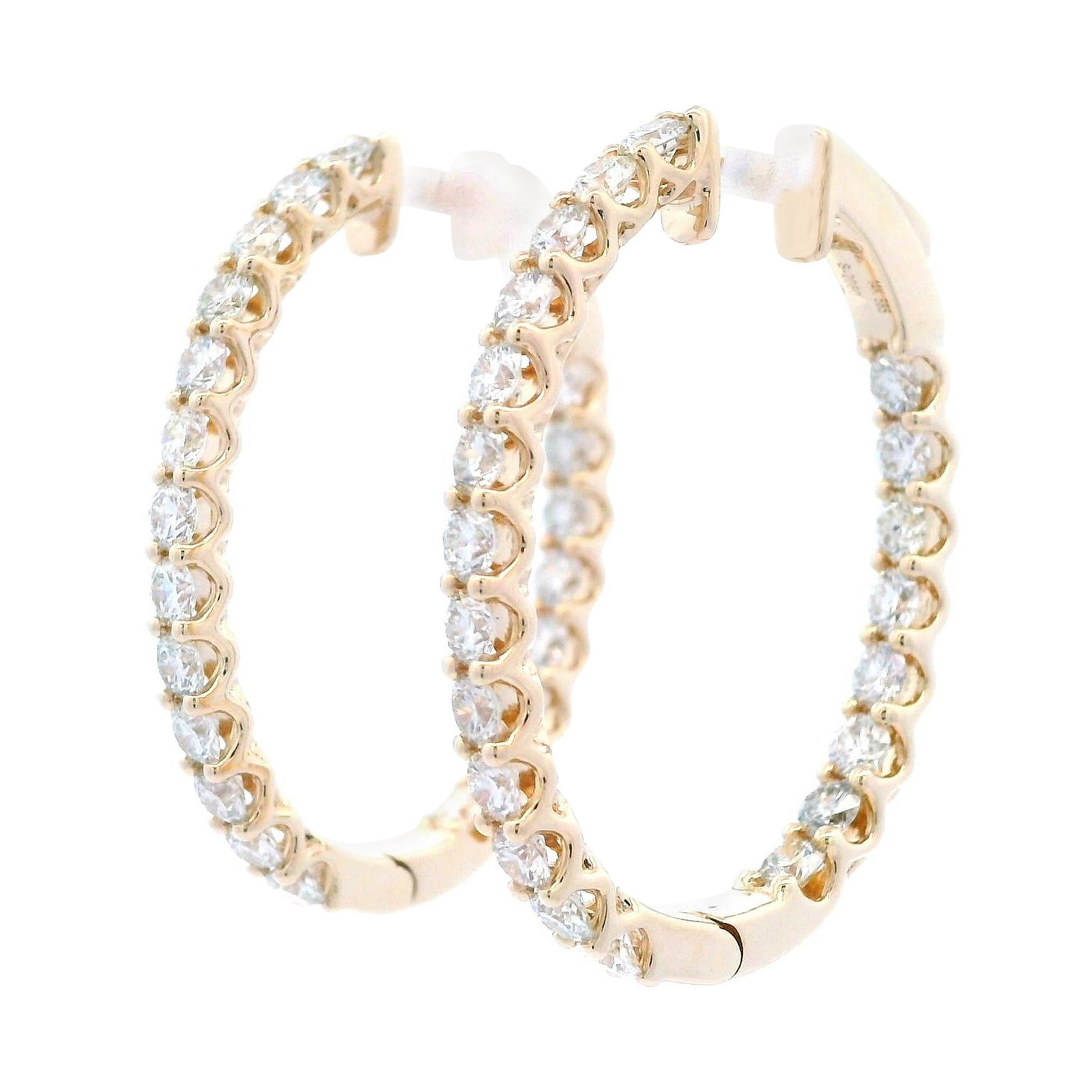 14k Yellow Gold 2.95 Carat Diamond Hoop Earrings 42 Stones: 14k Yellow Gold 2.95 Carat Diamond Hoop Earrings 42 Stones These stunning contemporary hoop earrings feature 42 round brilliant diamonds totaling 2.95 carats, beautifully set in luxurious 14k yellow g