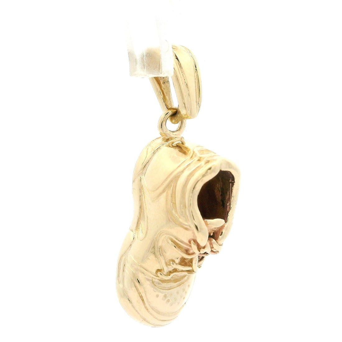 14k Yellow Gold Sneaker Lucky Charm Pendant with Bail: 14k Yellow Gold Sneaker Lucky Charm Pendant with Bail This charming pendant features a detailed sneaker design crafted from solid 14k yellow gold, making it a unique and stylish accessory. Perfect as 