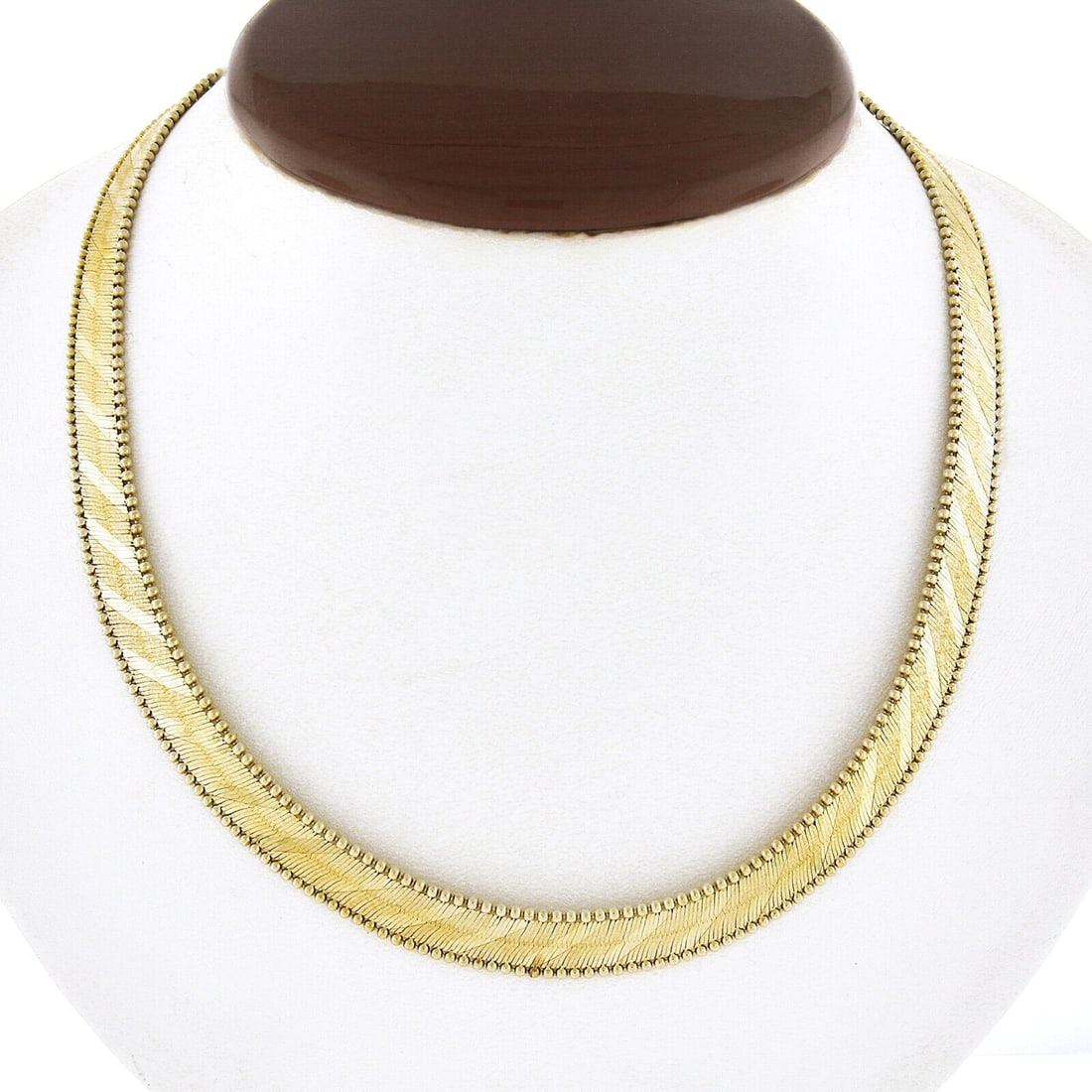 14k Yellow Gold Fancy Flat Link Necklace 17 Inch 9.1mm Beaded Edges: 14k Yellow Gold Fancy Flat Link Necklace 17 Inch 9.1mm Beaded Edges This elegant necklace is crafted from solid 14k yellow gold and features a 17-inch fancy flat link chain with alternating textured a