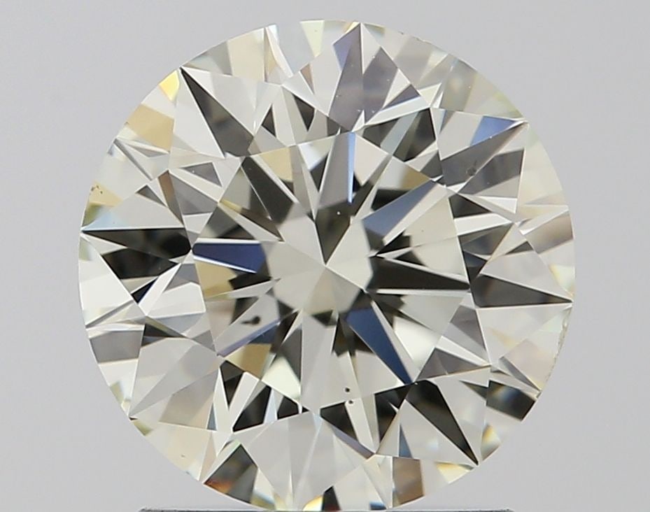 Loose Diamond - ROUND 1.71ct J VS2: Loose Diamond - ROUND 1.71ct J VS2 Source: Natural Shape: ROUND Carats: 1.71 Color: J Clarity: VS2 Certification: IGI Video: Video Link The Diamond Depot Guarantee: All items in this auction are