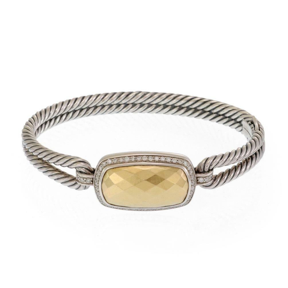 David Yurman Noblesse 18k Gold Sterling Silver Diamond Bracelet: David Yurman Noblesse 18k Gold Sterling Silver Diamond Bracelet This elegant bracelet from David Yurman's Noblesse Collection showcases a stunning combination of sterling silver and 18k yellow gold. T