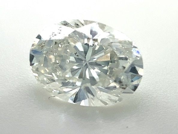 Loose Diamond - OVAL 0.98ct G SI2: Loose Diamond - OVAL 0.98ct G SI2 Source: Natural Shape: OVAL Carats: 0.98 Color: G Clarity: SI2 Certification: OTHER The Diamond Depot Guarantee: All items in this auction are guaranteed to be 100% a