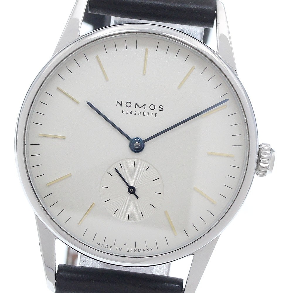 NOMOS Orion 35 Hand Wound Small Seconds Men's Wristwatch: NOMOS Orion 35 Hand Wound Small Seconds Men's Wristwatch This is a NOMOS Orion 35 Small Seconds hand-winding wristwatch designed for men. Made in Germany, this pre-owned timepiece features classic sty