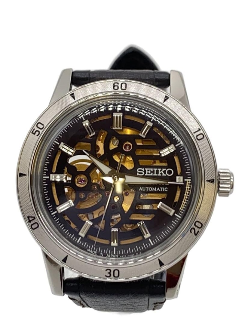 Seiko Presage Silver Leather Strap Wristwatch: Seiko Presage Silver Leather Strap Wristwatch This SEIKO PRESAGE SARY257 men's wristwatch features a silver-tone case paired with a leather strap. The watch is pre-owned and shows some scratches on th