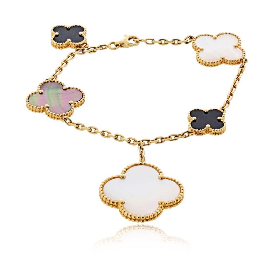 Van Cleef Arpels Alhambra Magic 18K Yellow Gold Bracelet: Van Cleef Arpels Alhambra Magic 18K Yellow Gold Bracelet This Van Cleef & Arpels Alhambra Magic bracelet features a refined design crafted from 18K yellow gold. The bracelet is in excellent pre-owned 