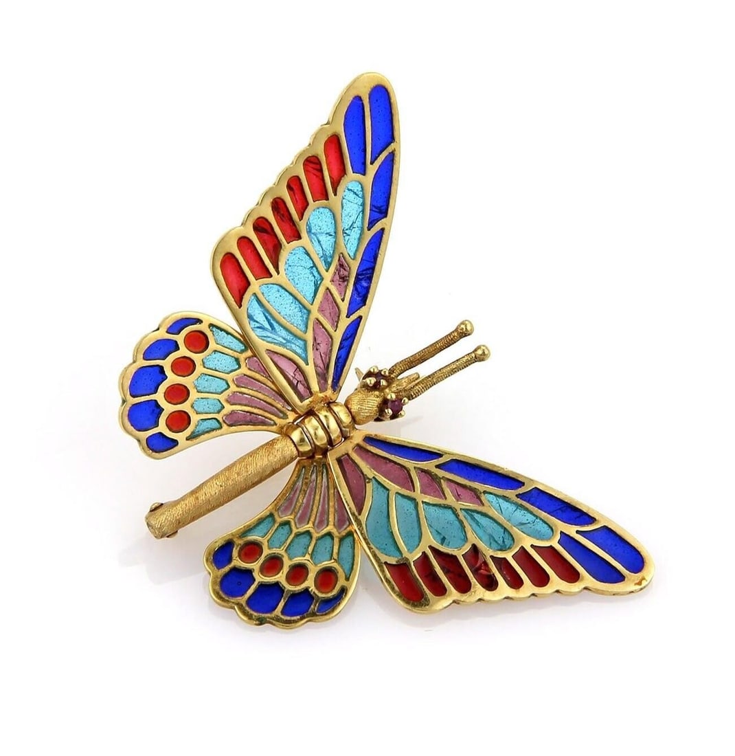 18k Yellow Gold Articulated Butterfly Brooch with Ruby Accents: 18k Yellow Gold Articulated Butterfly Brooch with Ruby Accents This vintage Movable Butterfly Plique-a-Jour Brooch is meticulously crafted from solid 18k yellow gold. The brooch features an articulate
