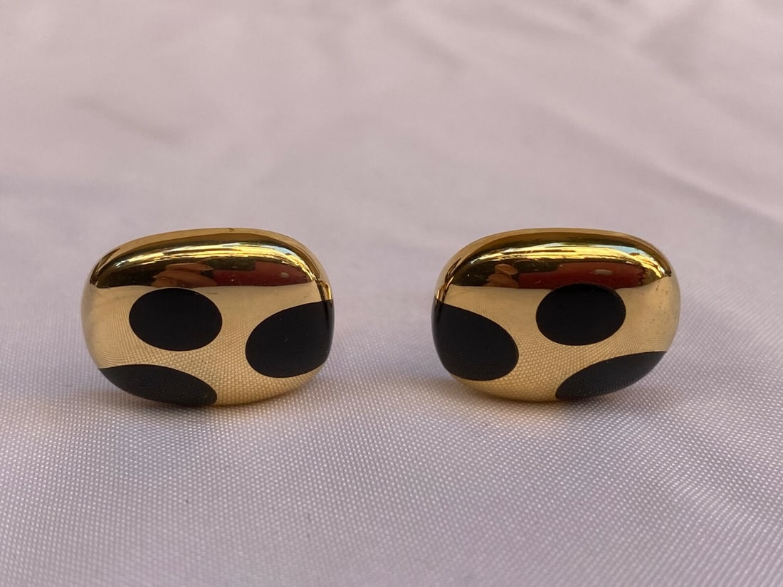 Elegant French 18K Gold Cufflinks with Glass Accents: Elegant French 18K Gold Cufflinks with Glass Accents This exquisite pair of French cufflinks is crafted from 18K yellow gold and features elegant glass accents. Measuring 7/16" x 3/8" and weighing 18 