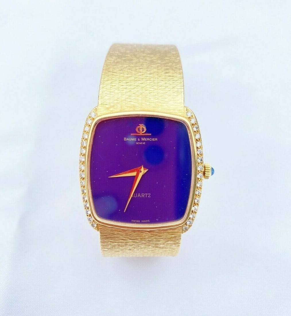 Baume & Mercier 18K Gold Diamond Watch with Lapis Face and Wooden Box: Baume & Mercier 18K Gold Diamond Watch with Lapis Face and Wooden Box Presenting a stunning Baume & Mercier 18K yellow gold diamond watch, a true masterpiece from the late 1970s to 1980s. This exquisi