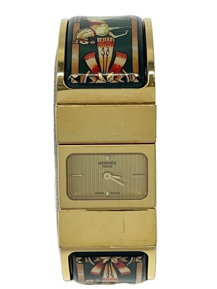 Hermes Loquet LO1.201 Swiss Quartz Ladies Wristwatch: Hermes Loquet LO1.201 Swiss Quartz Ladies Wristwatch This HERMES Loquet Quartz LO1.201 is a women's wristwatch crafted with Swiss-sourced materials. It features a rectangular case and a quartz movemen