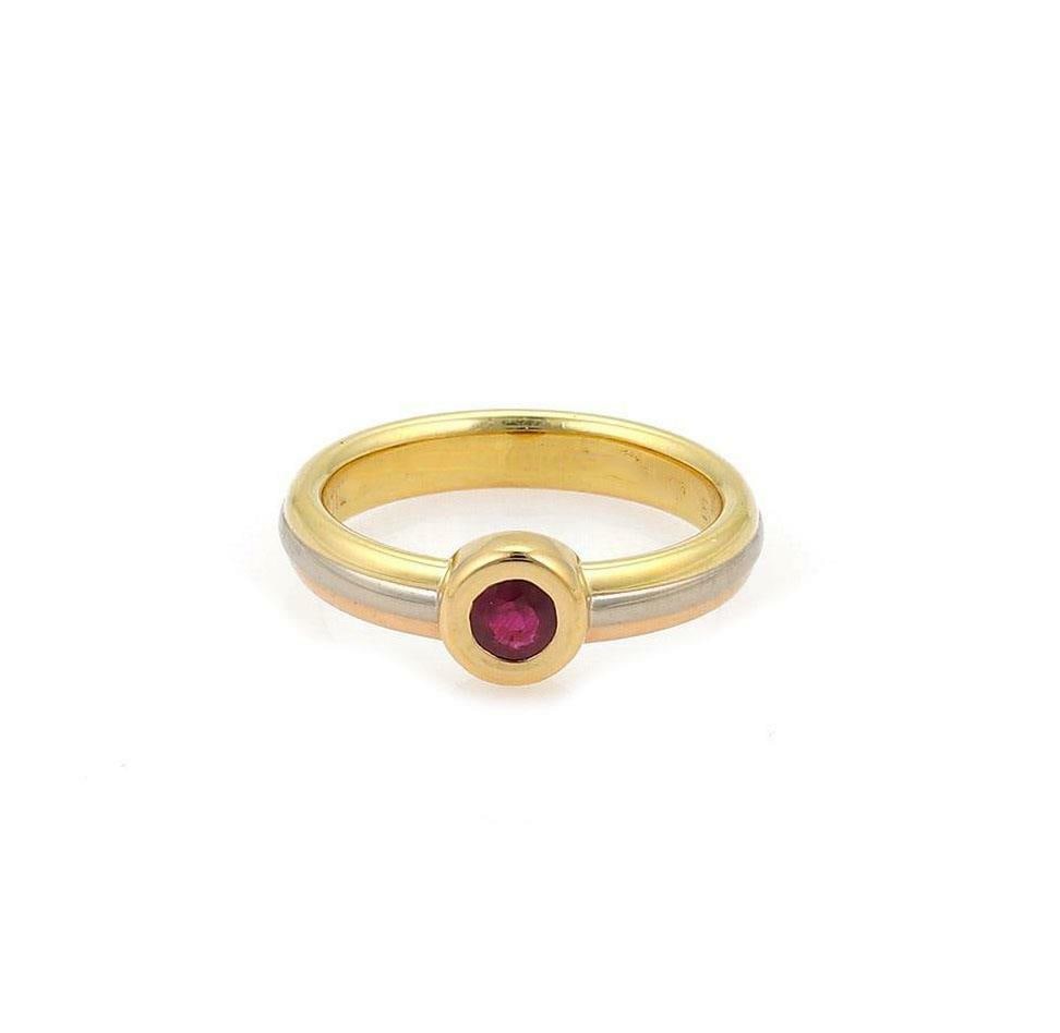 Cartier 18k Tricolor Gold Ruby Stack Band Ring US 4.5: Cartier 18k Tricolor Gold Ruby Stack Band Ring US 4.5 This exquisite Cartier ring showcases a beautiful blend of 18k yellow, rose, and white gold, expertly crafted into a tri-color design. The ring fe