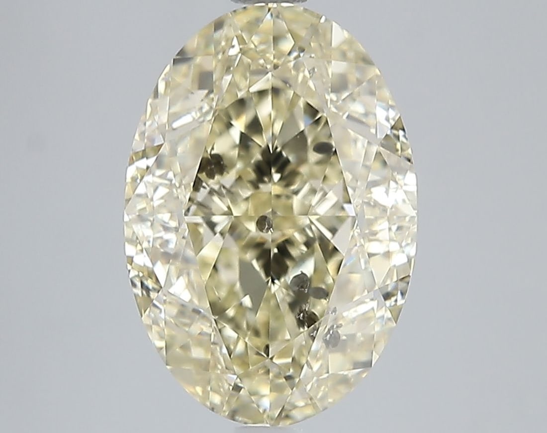 Loose Diamond - OVAL 5.06ct Fancy Brownish Yellow I1: Loose Diamond - OVAL 5.06ct Fancy Brownish Yellow I1 Source: Natural Shape: OVAL Carats: 5.06 Color: Fancy Brownish Yellow Certification: GIA Video: