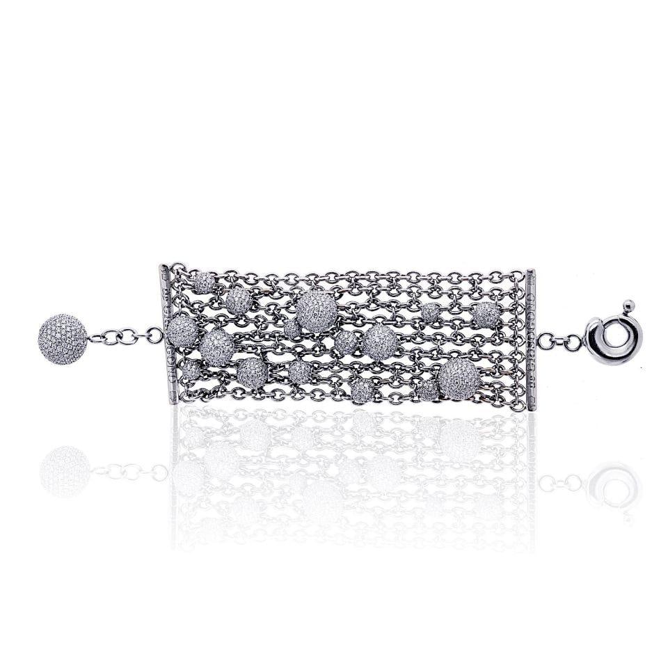 De Grisogono Boule 18K White Gold Diamond Bracelet: De Grisogono Boule 18K White Gold Diamond Bracelet This De Grisogono Boule bracelet is crafted from 18K white gold and features the brand's signature pave diamond sphere motif. The design showcases 35