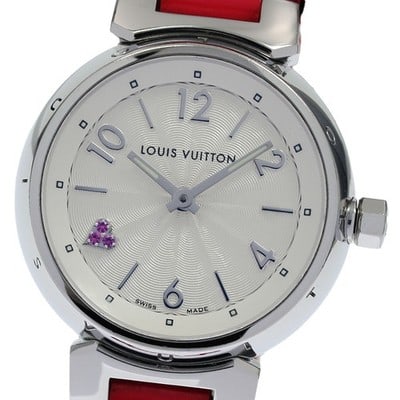 Louis Vuitton Tambour Quartz Women's Wristwatch Q1218: Louis Vuitton Tambour Quartz Women's Wristwatch Q1218 This Louis Vuitton Tambour Heart Q1218 women's wristwatch features a stainless steel case paired with a silver dial and a leather strap. The watch
