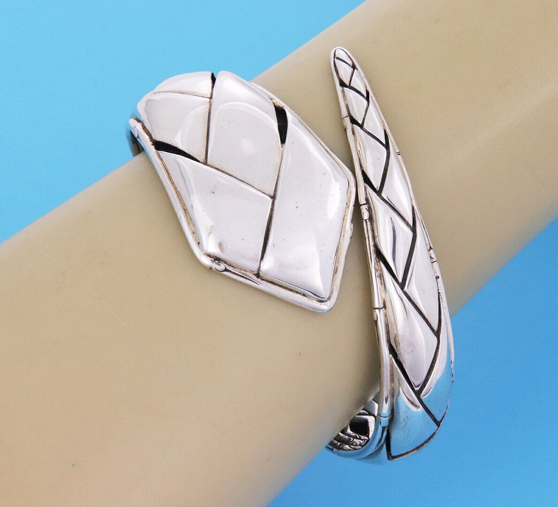 John Hardy Sterling Silver Bamboo Motif Flex Bypass Bracelet: John Hardy Sterling Silver Bamboo Motif Flex Bypass Bracelet This John Hardy Bamboo Bypass Flex Bracelet is crafted in sterling silver and features a sculptural bamboo-inspired motif. The flexible byp
