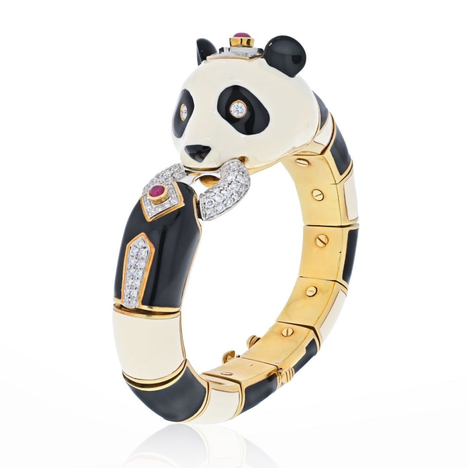 David Webb 1970s Platinum Gold Panda Bracelet with Enamel and Rubies: David Webb 1970s Platinum Gold Panda Bracelet with Enamel and Rubies This exquisite vintage panda bracelet, designed by David Webb, is a stunning combination of platinum and 18K yellow gold. Crafted i