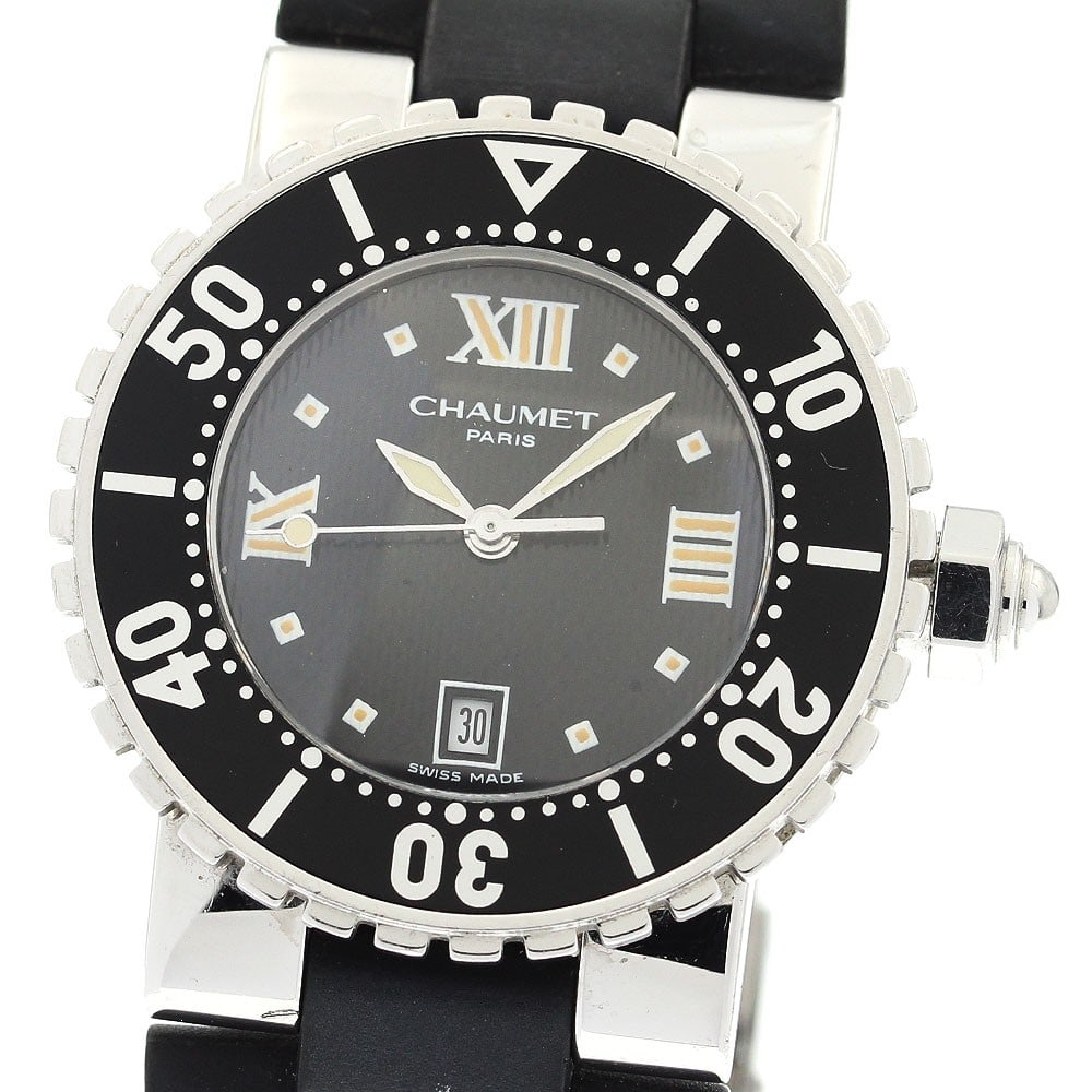 Chaumet Class One Quartz Date Womens Wristwatch W06213-086: Chaumet Class One Quartz Date Womens Wristwatch W06213-086 This Chaumet Class One Date Quartz women's wristwatch features a stainless steel case paired with a black rubber bracelet. The watch is power