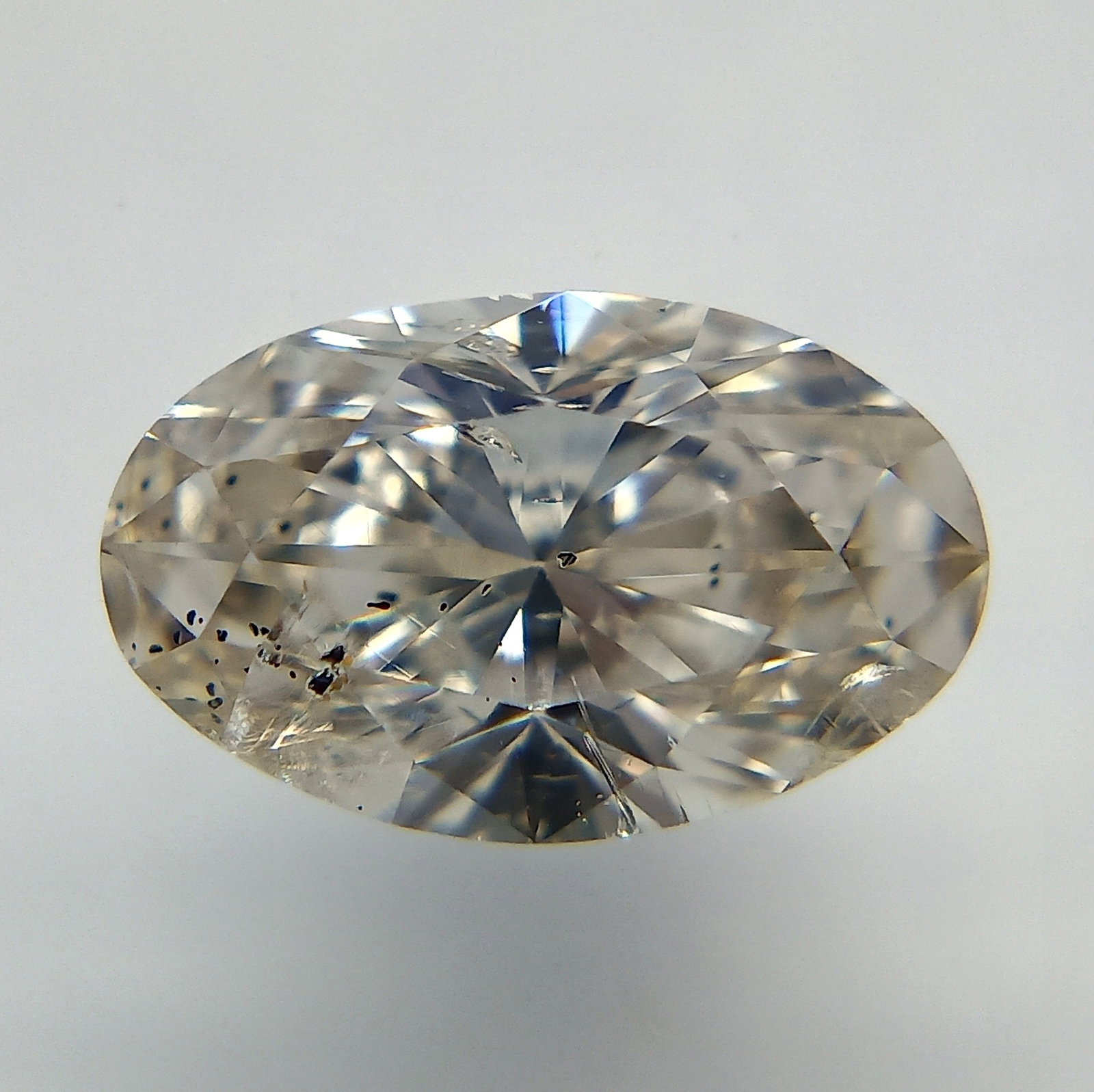 Loose Diamond - OVAL 0.8ct J I2: Loose Diamond - OVAL 0.8ct J I2 Source: Natural Shape: OVAL Carats: 0.8 Color: J Clarity: I2 Certification: IGI The Diamond Depot Guarantee: All items in this auction are guaranteed to be 100% authent