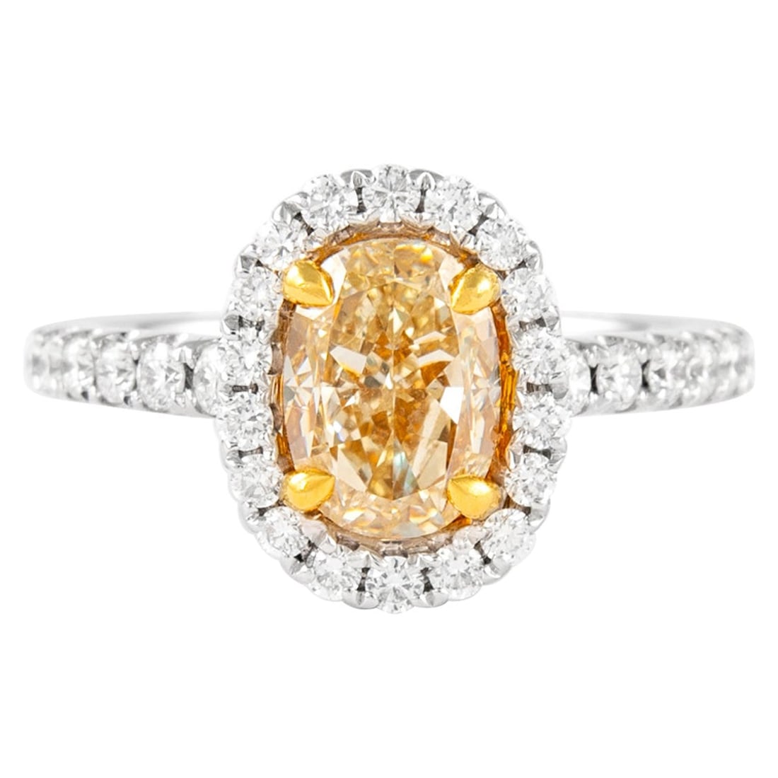 2.66ct Fancy Yellow Diamond Halo Ring EGL Certified: 2.66ct Fancy Yellow Diamond Halo Ring EGL Certified This exquisite ring features a stunning 2.66 carat Fancy Yellow Oval Diamond, certified by EGL, surrounded by a halo of 30 round brilliant diamonds 
