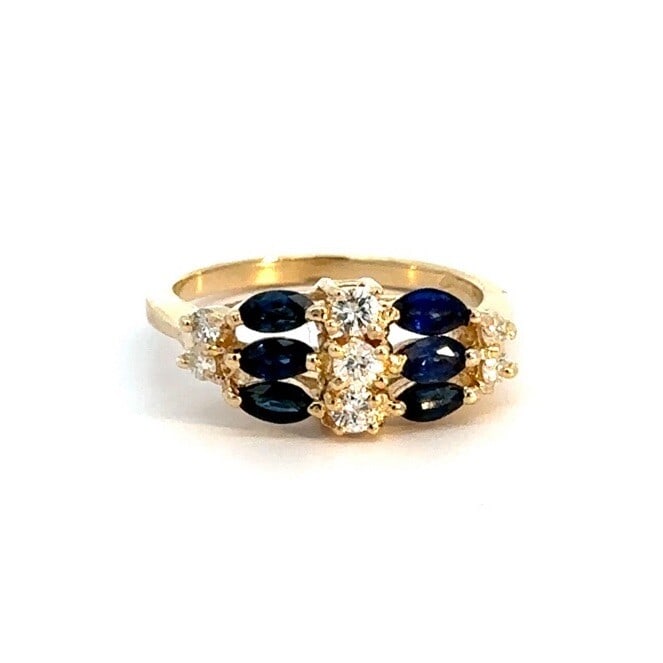 14k Yellow Gold Marquise Sapphire and Diamond Cocktail Ring: 14k Yellow Gold Marquise Sapphire and Diamond Cocktail Ring This exquisite 14k Yellow Gold High Profile Cocktail Ring features a stunning marquise sapphire at its center, complemented by nine round br