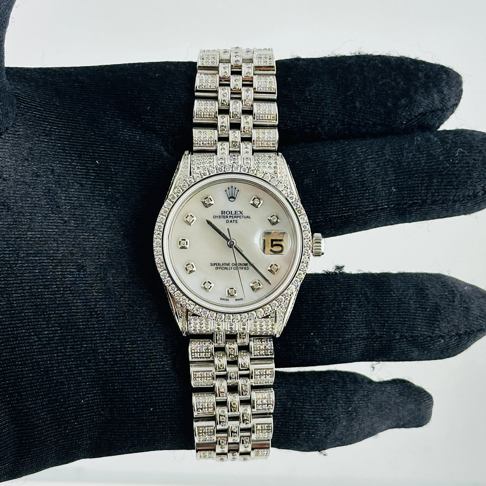 AM Diamond Dial Oyster Perpetual Date Ref 6694 With Jubilee Bracelet: AM Diamond Dial Oyster Perpetual Date Ref 6694 With Jubilee Bracelet This Rolex Oyster Perpetual Date features a white mother-of-pearl dial accented with diamond hour markers. The watch is equipped wi
