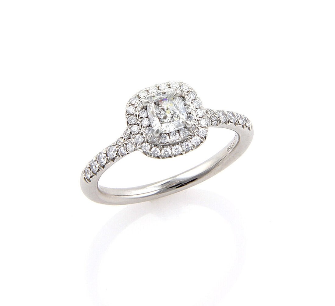 Tiffany Soleste platinum diamond halo ring size 6: Tiffany Soleste platinum diamond halo ring size 6 This authentic Tiffany & Co. Soleste ring is crafted from PT950 platinum and features a brilliant diamond centerpiece surrounded by a delicate halo de