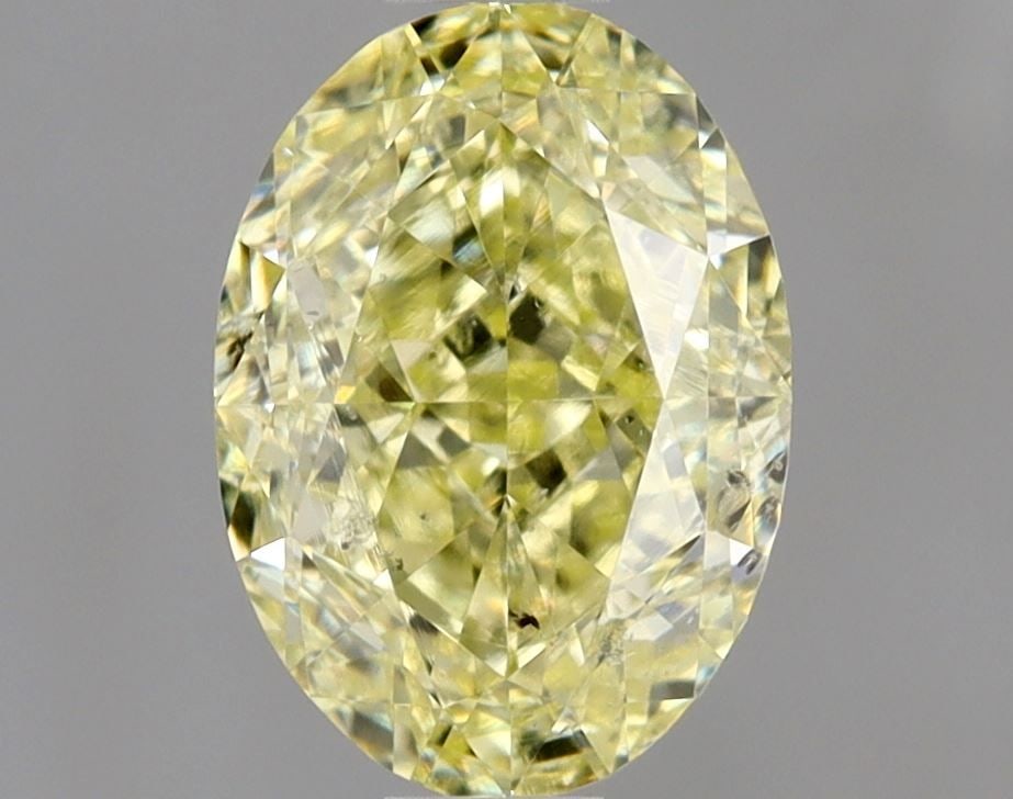 Loose Diamond - OVAL 1.01ct Fancy Light Yellow SI2: Loose Diamond - OVAL 1.01ct Fancy Light Yellow SI2 Source: Natural Shape: OVAL Carats: 1.01 Color: Fancy Light Yellow Certification: GIA Video: