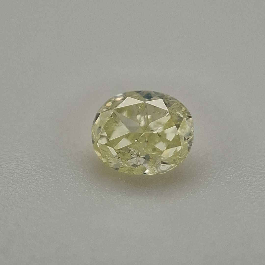 Loose Diamond - OVAL 0.37ct Fancy Yellow I1: Loose Diamond - OVAL 0.37ct Fancy Yellow I1 Source: Natural Shape: OVAL Carats: 0.37 Color: Fancy Yellow Certification: EGL The Diamond Depot Guarantee: All items in this auction are guaranteed to be 