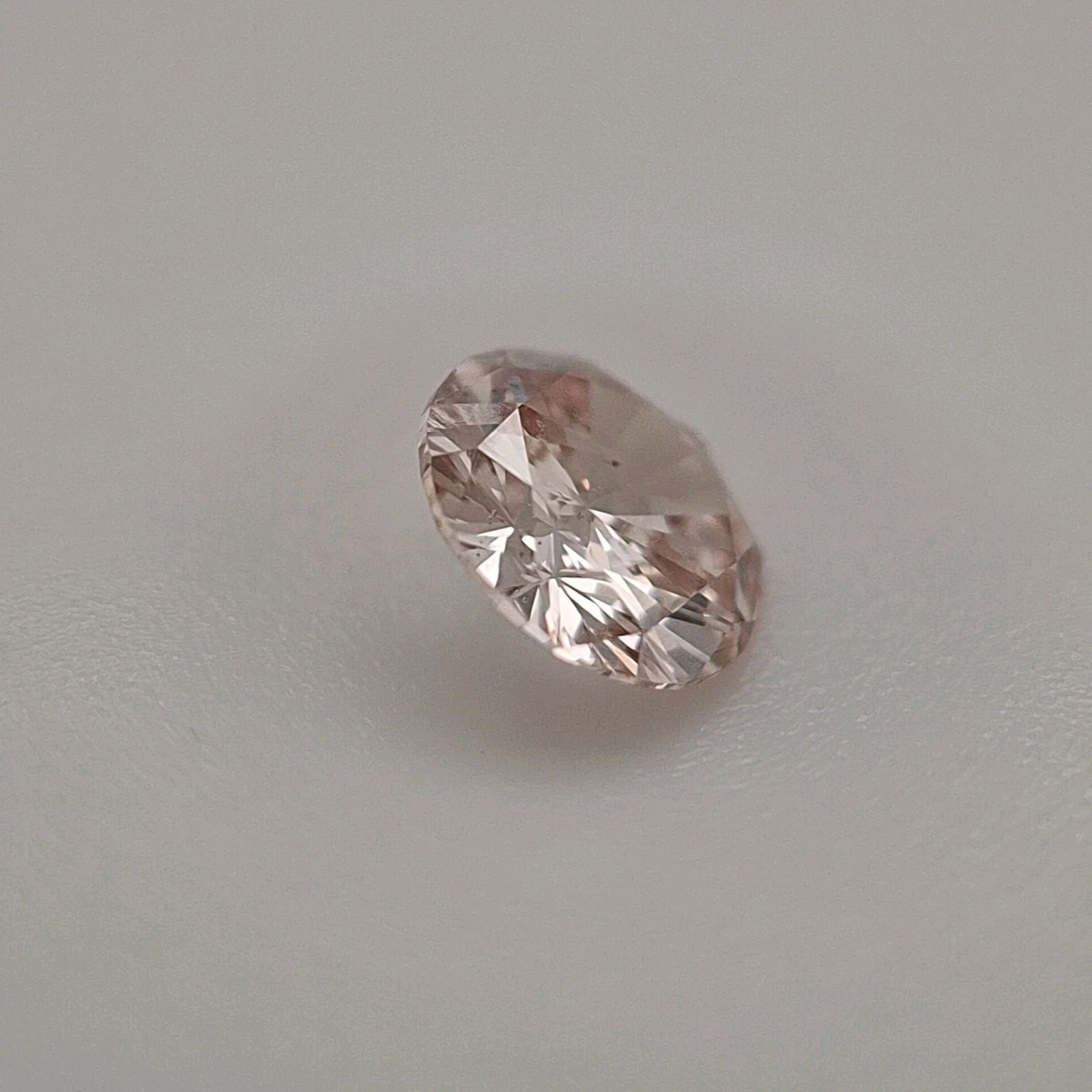 Loose Diamond - ROUND 0.24ct Fancy Pinkish Brown I1: Loose Diamond - ROUND 0.24ct Fancy Pinkish Brown I1 Source: Natural Shape: ROUND Carats: 0.24 Color: Fancy Pinkish Brown Certification: EGL The Diamond Depot Guarantee: All items in this auction are g