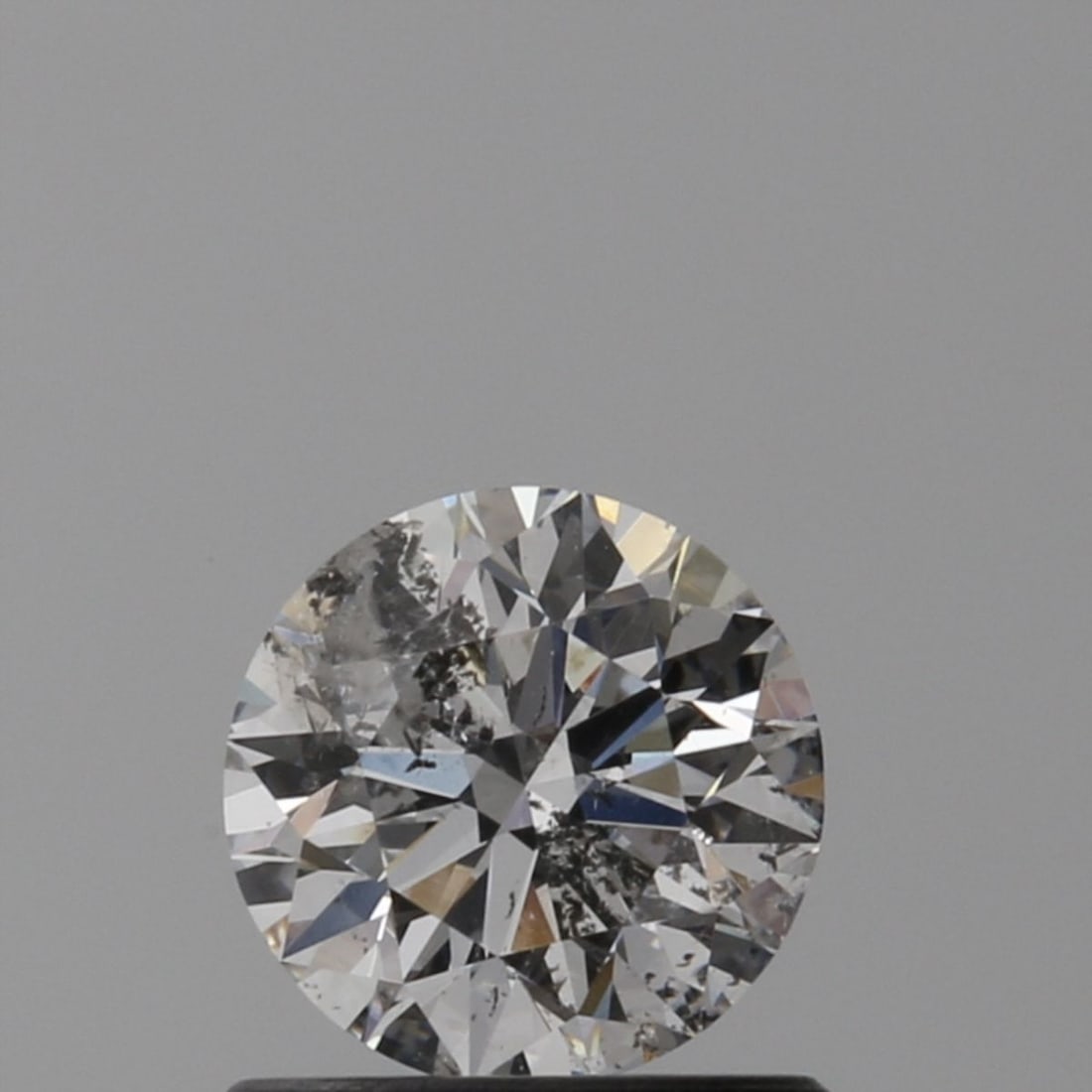 Loose Diamond - ROUND 0.66ct F I2: Loose Diamond - ROUND 0.66ct F I2 Source: Natural Shape: ROUND Carats: 0.66 Color: F Clarity: I2 Certification: GIA Video:
