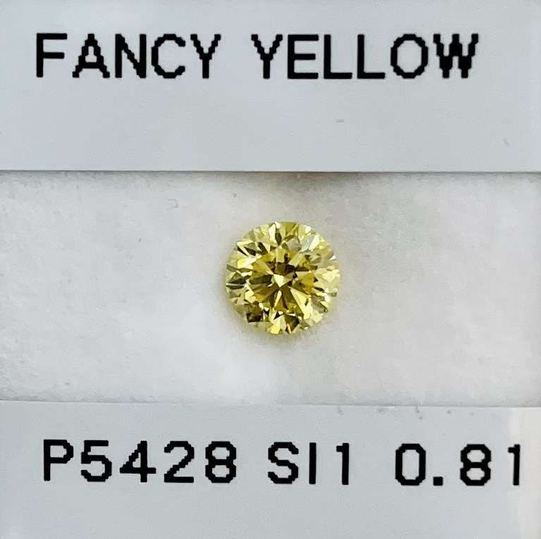 Loose Diamond - ROUND 0.81ct Fancy Intense Yellow SI1: Loose Diamond - ROUND 0.81ct Fancy Intense Yellow SI1 Source: Natural Shape: ROUND Carats: 0.81 Color: Fancy Intense Yellow Certification: GIA Video: