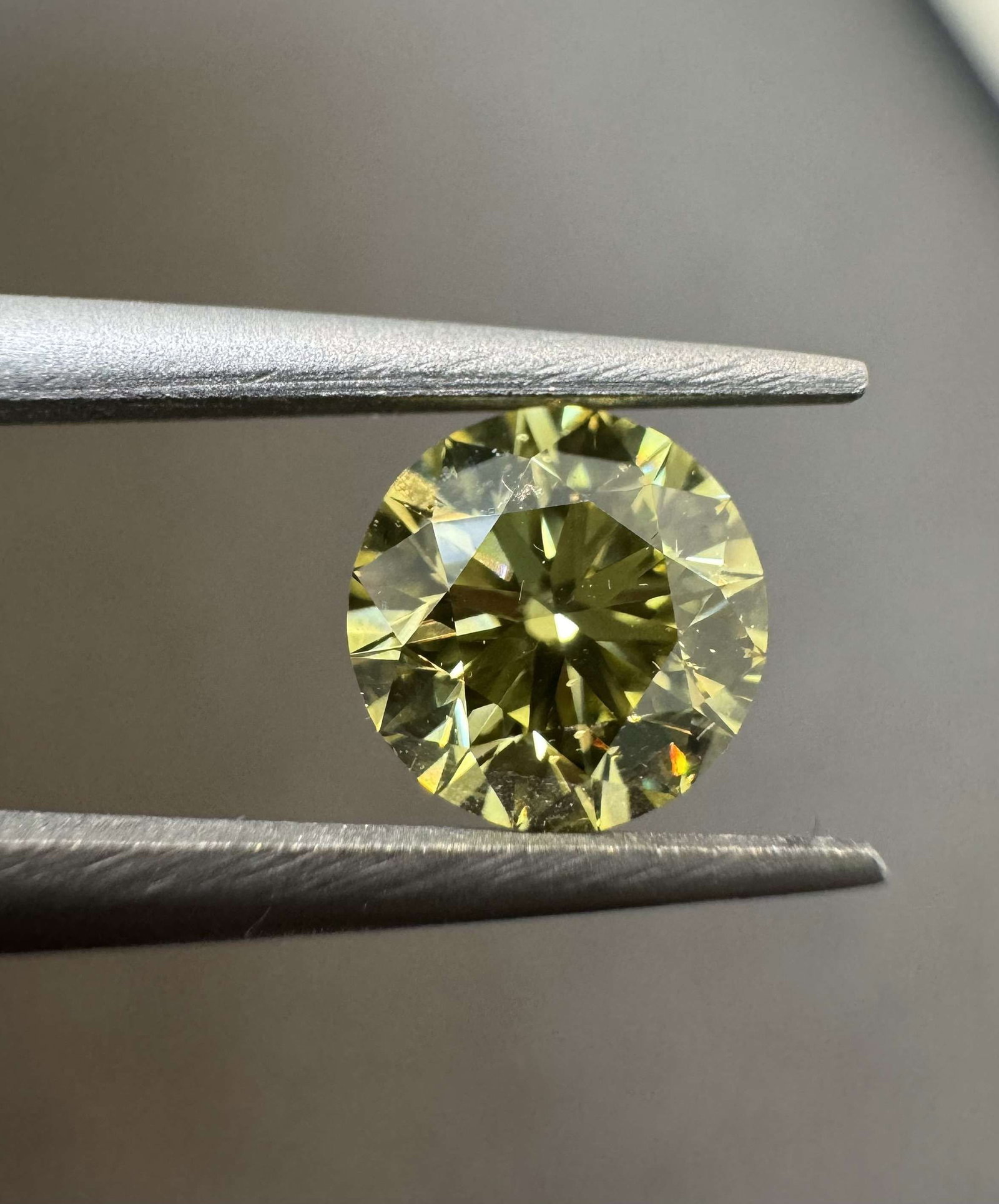 Loose Diamond - ROUND 0.74ct Fancy Intense Yellow SI1: Loose Diamond - ROUND 0.74ct Fancy Intense Yellow SI1 Source: Natural Shape: ROUND Carats: 0.74 Color: Fancy Intense Yellow Certification: GIA Video: