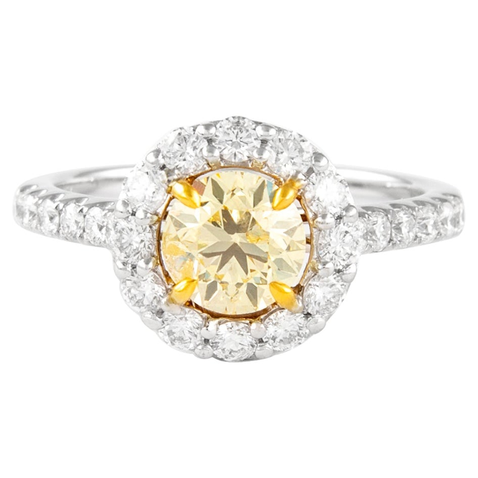 1.76ct Fancy Yellow Diamond Halo Ring 18k Gold EGL Certified: 1.76ct Fancy Yellow Diamond Halo Ring 18k Gold EGL Certified This exquisite 1.76ctt Fancy Yellow Cushion Diamond Halo Ring features a stunning combination of 18k yellow and white gold, making it a per
