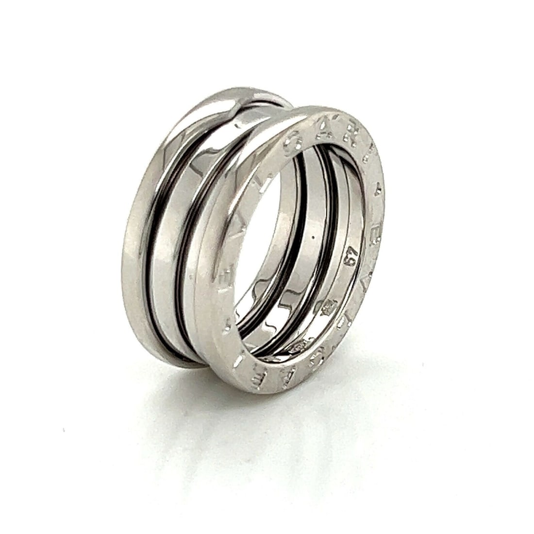 Bvlgari B.zero1 18k White Gold Three-Band Ring EU 49 US 5: Bvlgari B.zero1 18k White Gold Three-Band Ring EU 49 US 5 This authentic Bvlgari B.zero1 ring is crafted from solid 18k white gold and features the collection's iconic architectural spiral design in a