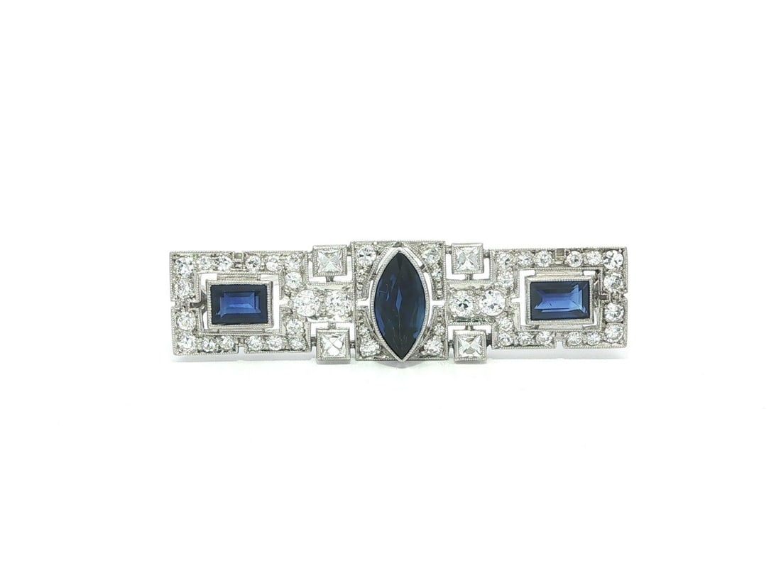 Art Deco Platinum Sapphire Diamond Bar Pin Brooch GIA Certified: Art Deco Platinum Sapphire Diamond Bar Pin Brooch GIA Certified This antique Art Deco bar pin brooch features a sophisticated design crafted from solid platinum with a 13-14k white gold pin. The piece