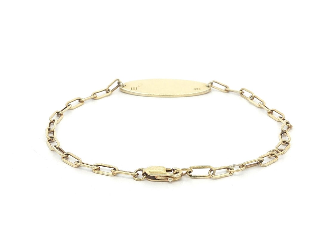 Jennifer Zeuner Sterling Silver Gold Plated ID Bar Bracelet Adjustable: Jennifer Zeuner Sterling Silver Gold Plated ID Bar Bracelet Adjustable This adjustable paper clip link bracelet features an ID bar crafted from sterling silver with yellow gold plating. The bracelet i