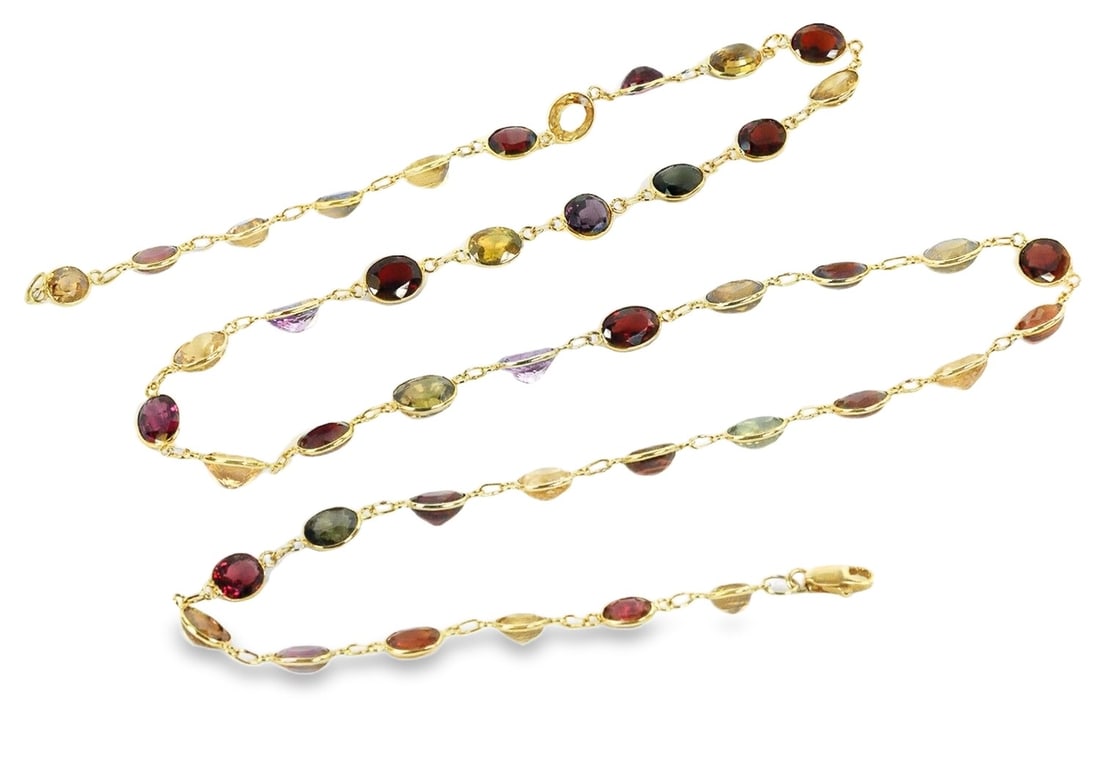 Vintage 14k Yellow Gold Necklace with Multicolor Gemstone Oval Links: Vintage 14k Yellow Gold Necklace with Multicolor Gemstone Oval Links This vintage necklace is crafted from 14k yellow gold and features a striking oval link chain adorned with a vibrant mix of multico